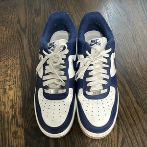 Nike men’s Air Force 1 sneakers. Size 8.5. Worn but very good condition.